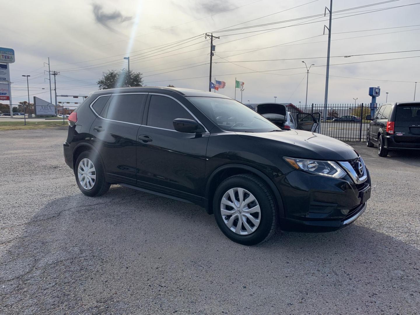 2017 Black /Black Nissan Rogue SV 2WD (5N1AT2MT0HC) with an 2.5L L4 DOHC 16V engine, AUTOMATIC transmission, located at 1830 North Belt Line Road, Irving, TX, 75061, (469) 524-0199, 32.834373, -96.993584 - Photo#8