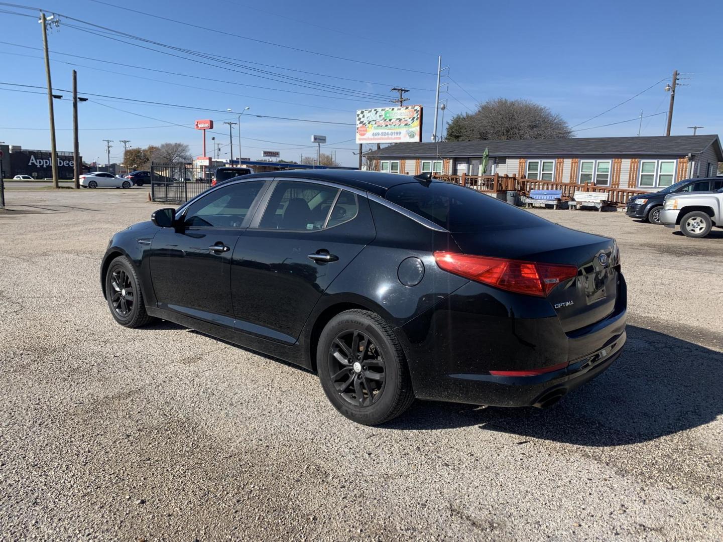 2012 Black /TAN Kia Optima LX (KNAGM4A70C5) with an 2.4L L4 DOHC 16V engine, AUTOMATIC transmission, located at 1830 North Belt Line Road, Irving, TX, 75061, (469) 524-0199, 32.834373, -96.993584 - Photo#2