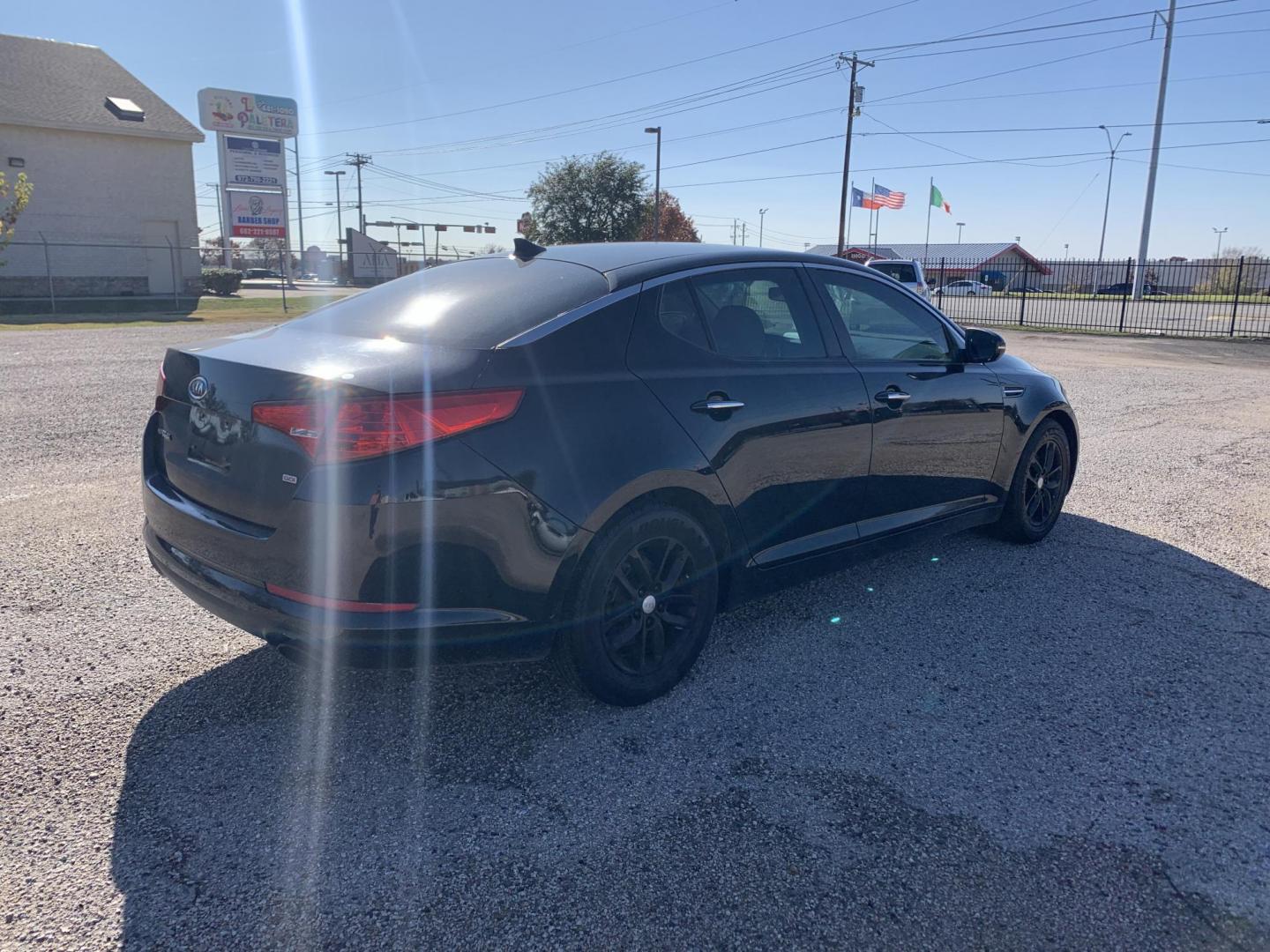 2012 Black /TAN Kia Optima LX (KNAGM4A70C5) with an 2.4L L4 DOHC 16V engine, AUTOMATIC transmission, located at 1830 North Belt Line Road, Irving, TX, 75061, (469) 524-0199, 32.834373, -96.993584 - Photo#3