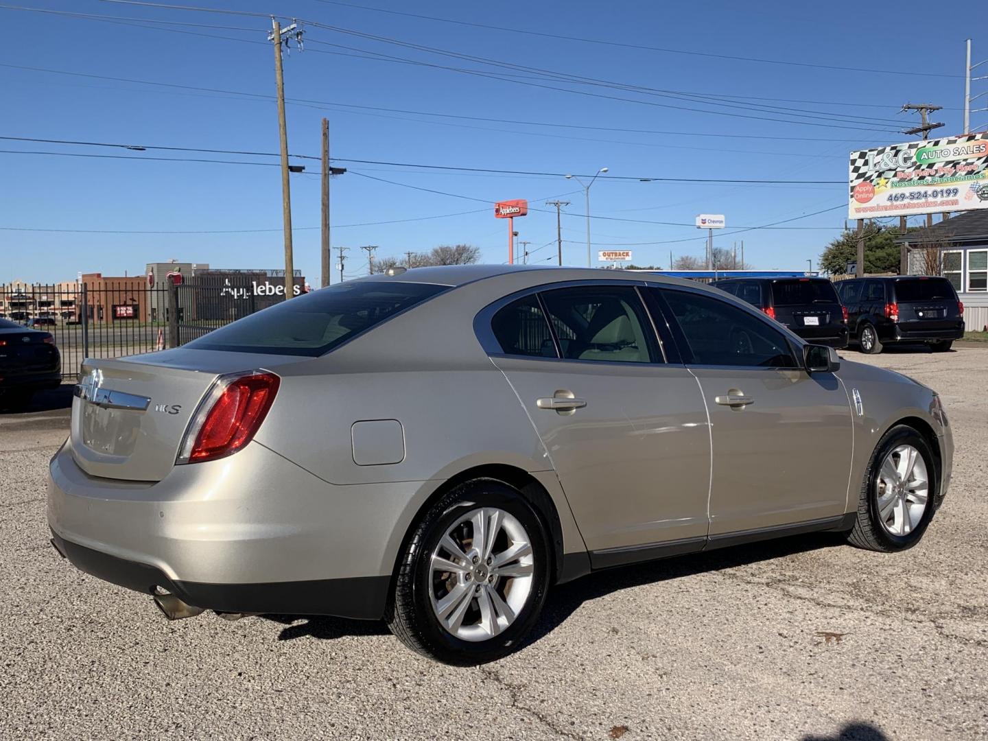 2011 Tan /Tan Lincoln MKS 3.7L FWD (1LNHL9DR3BG) with an 3.7L V6 DOHC 24V engine, AUTOMATIC transmission, located at 1830 North Belt Line Road, Irving, TX, 75061, (469) 524-0199, 32.834373, -96.993584 - Photo#4