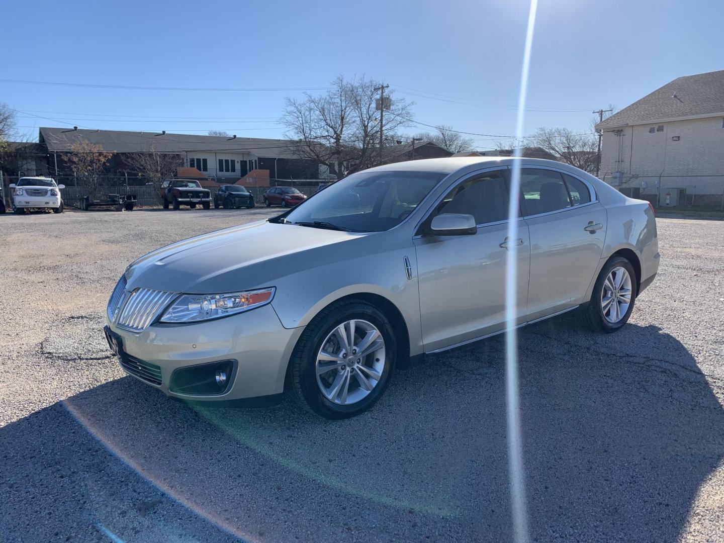 2011 Tan /Tan Lincoln MKS 3.7L FWD (1LNHL9DR3BG) with an 3.7L V6 DOHC 24V engine, AUTOMATIC transmission, located at 1830 North Belt Line Road, Irving, TX, 75061, (469) 524-0199, 32.834373, -96.993584 - Photo#5