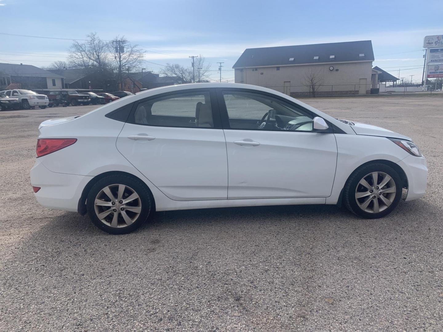 2013 White /Tan Hyundai Accent GLS 4-Door (KMHCU4AE0DU) with an 1.6L L4 DOHC 16V engine, AUTOMATIC transmission, located at 1830 North Belt Line Road, Irving, TX, 75061, (469) 524-0199, 32.834373, -96.993584 - Photo#0