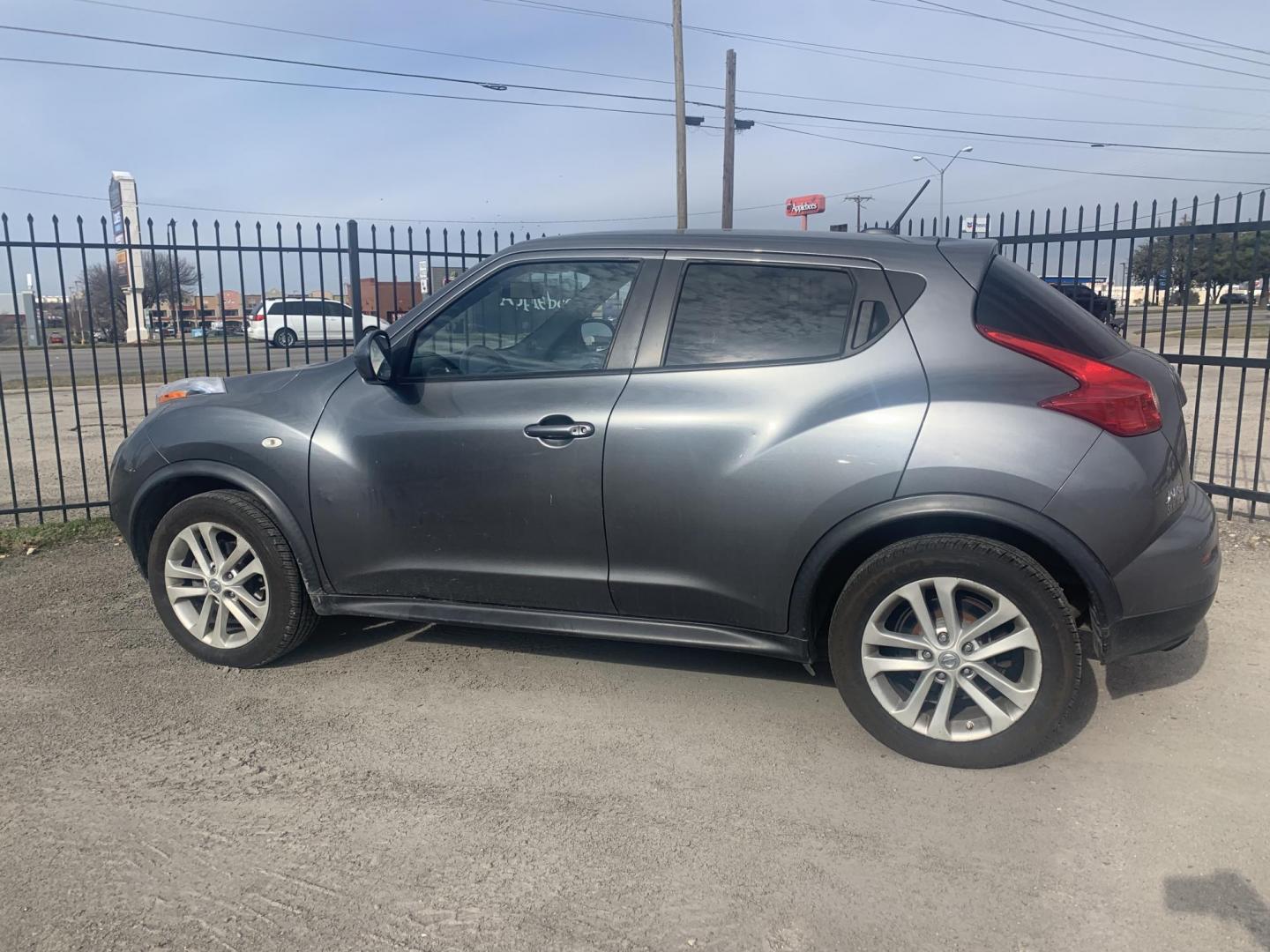 2013 Gray /Black Nissan Juke S AWD (JN8AF5MV1DT) with an 1.6L L4 DOHC 16V engine, AUTOMATIC transmission, located at 1830 North Belt Line Road, Irving, TX, 75061, (469) 524-0199, 32.834373, -96.993584 - Photo#0