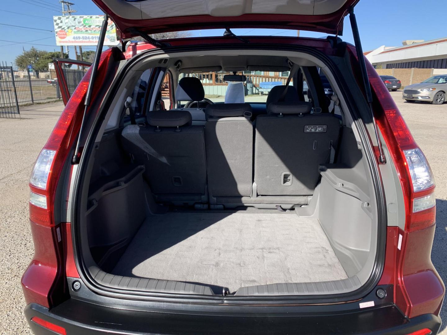 2008 Maroon /Black Honda CR-V LX 2WD AT (3CZRE38358G) with an 2.4L L4 DOHC 16V engine, AUTOMATIC transmission, located at 1830 North Belt Line Road, Irving, TX, 75061, (469) 524-0199, 32.834373, -96.993584 - Photo#7