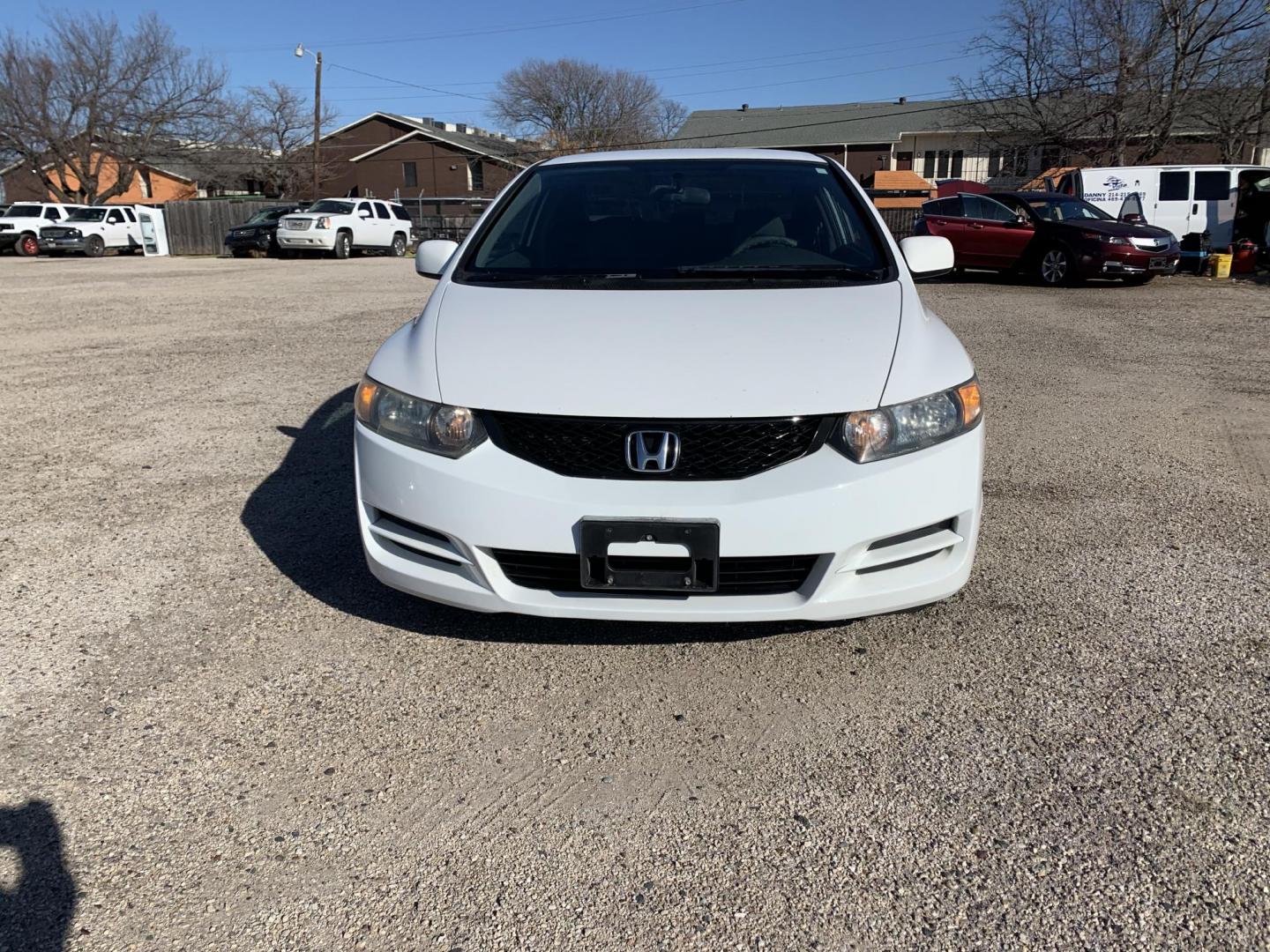 2009 White /gray Honda Civic LX Coupe (2HGFG12619H) with an 1.8L L4 SOHC 16V engine, AUTOMATIC transmission, located at 1830 North Belt Line Road, Irving, TX, 75061, (469) 524-0199, 32.834373, -96.993584 - Photo#0