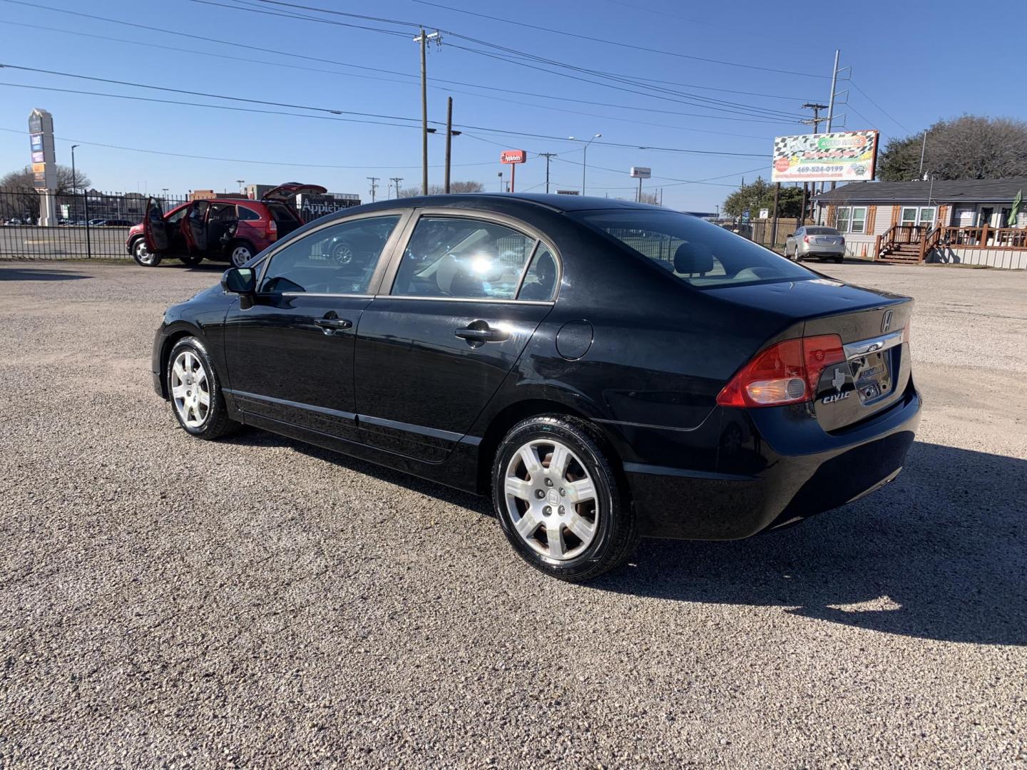 2010 Black /gray Honda Civic LX Sedan (19XFA1F56AE) with an 1.8L L4 SOHC 16V engine, Automatic transmission, located at 1830 North Belt Line Road, Irving, TX, 75061, (469) 524-0199, 32.834373, -96.993584 - Photo#0