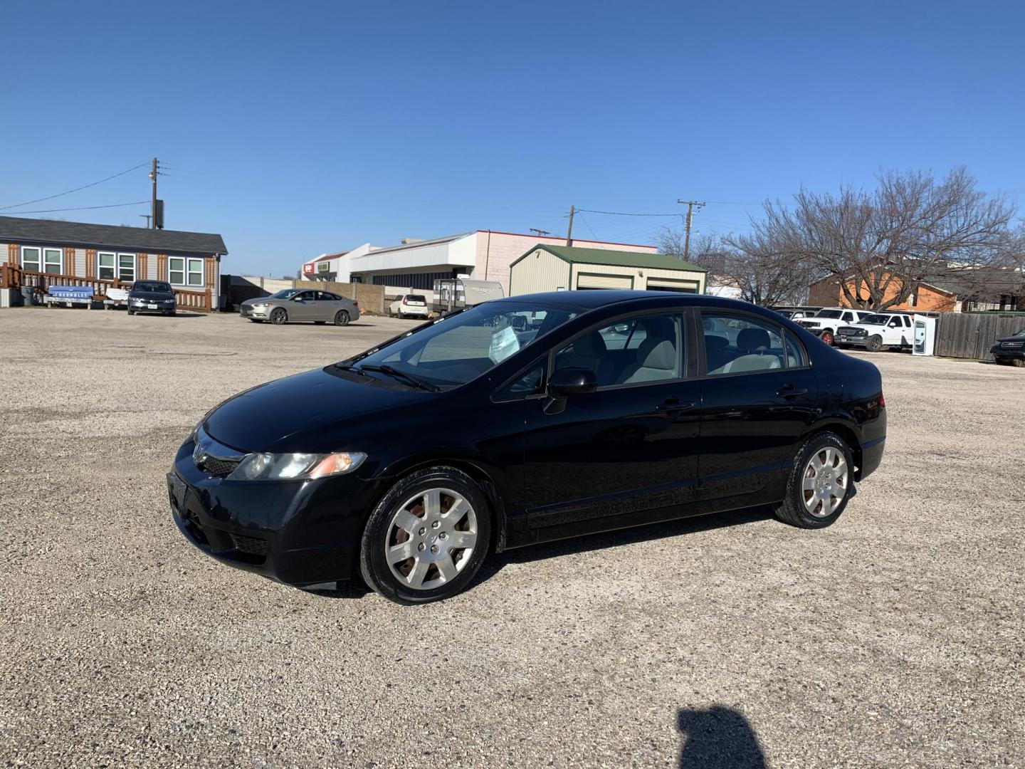 2010 Black /gray Honda Civic LX Sedan (19XFA1F56AE) with an 1.8L L4 SOHC 16V engine, Automatic transmission, located at 1830 North Belt Line Road, Irving, TX, 75061, (469) 524-0199, 32.834373, -96.993584 - Photo#2